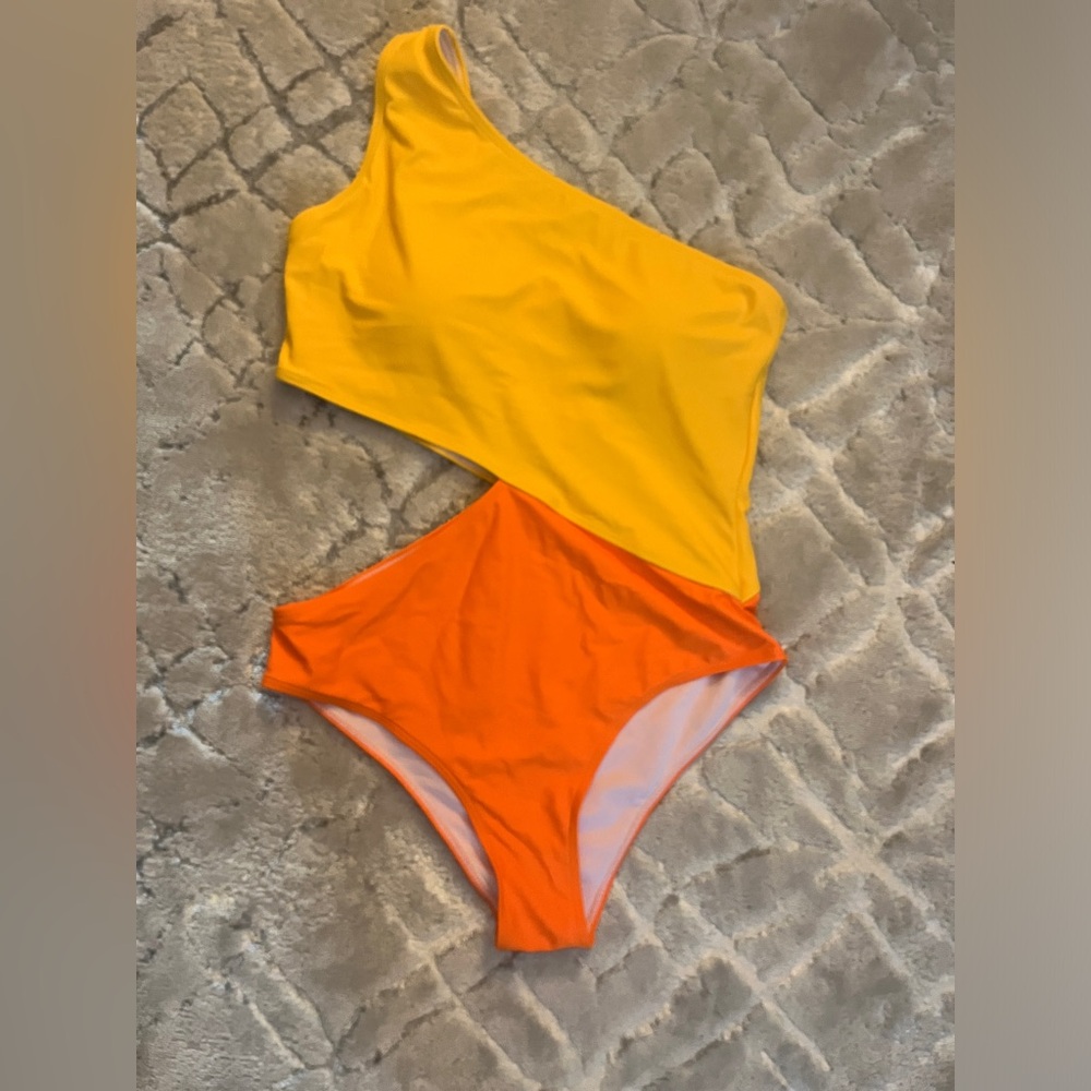 One piece swim suit yellow and orange, never worn, brand new